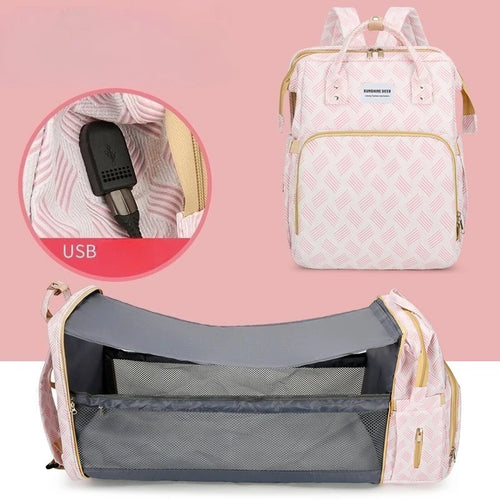 Un lit bébé pliable